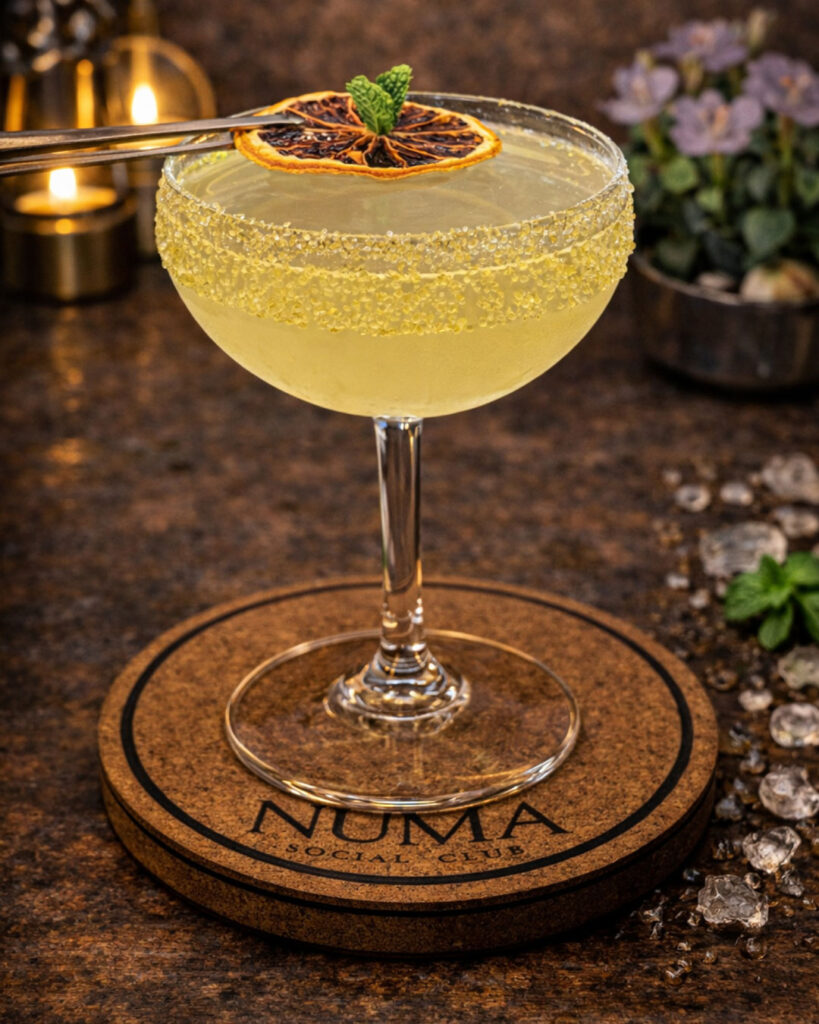 Tommy Margarita cocktail at Numa Phuket, served with fresh lime and premium tequila in a chilled glass